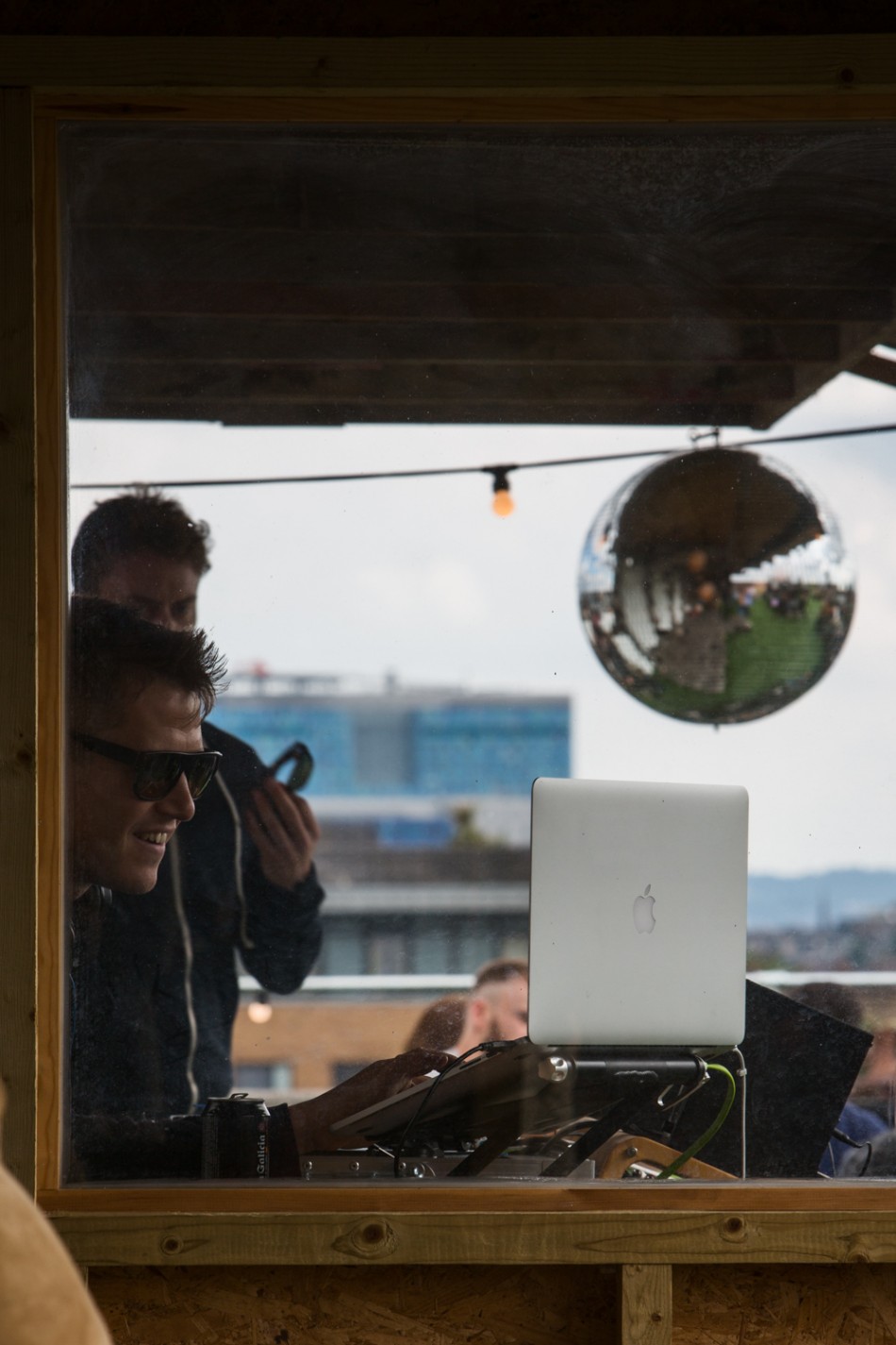 Hipsters on a rooftop bar in Broadway Market