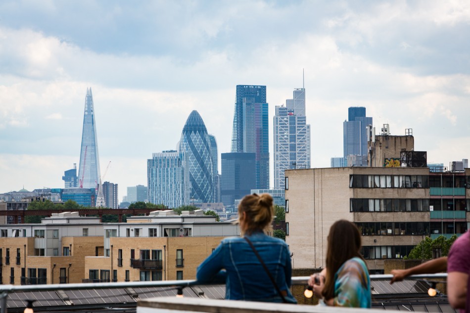 Hipsters on a rooftop bar in Broadway Market